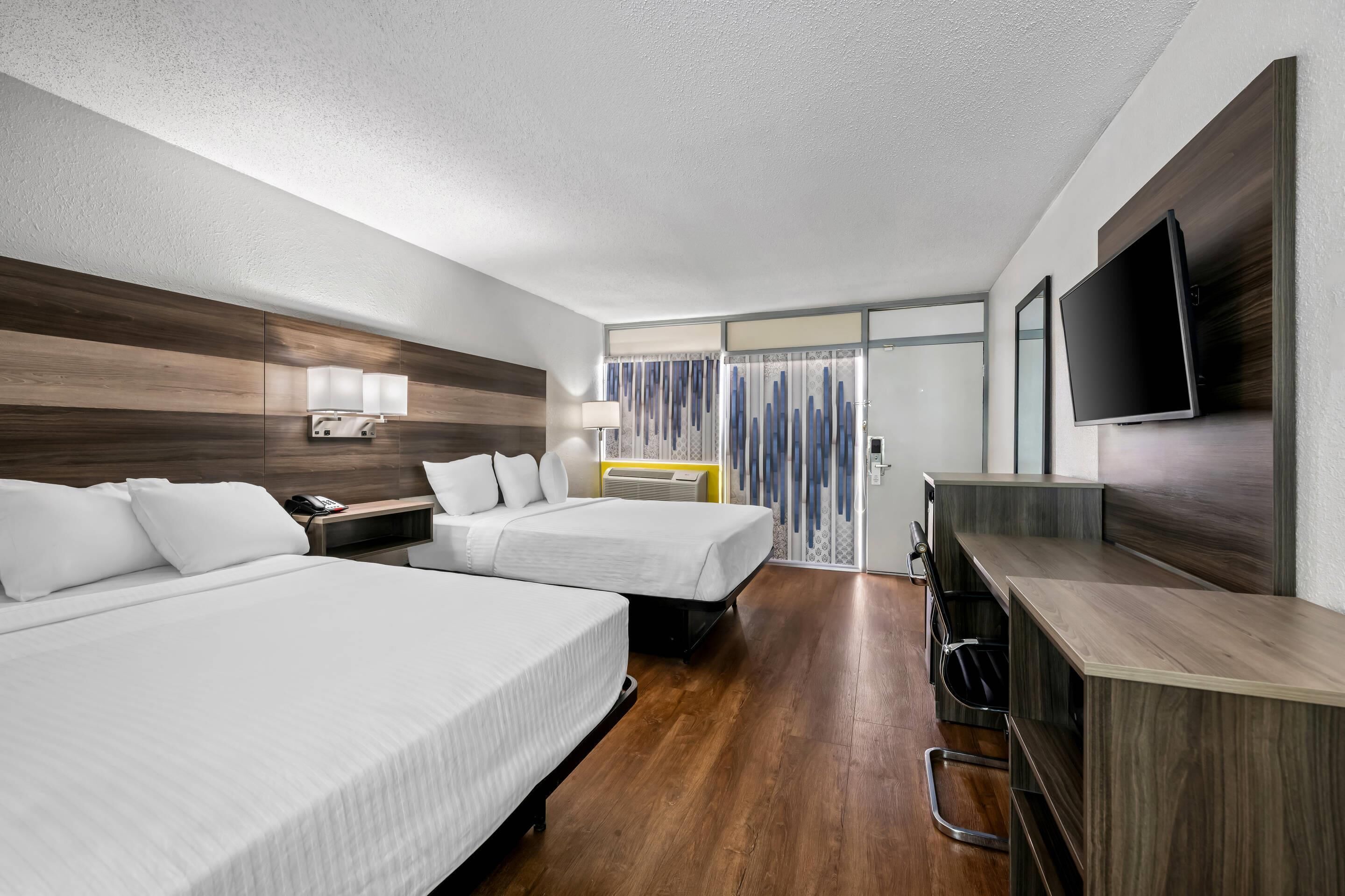 Standard Room, 2 Queen Beds, Non Smoking | Individually furnished, desk, blackout drapes, soundproofing