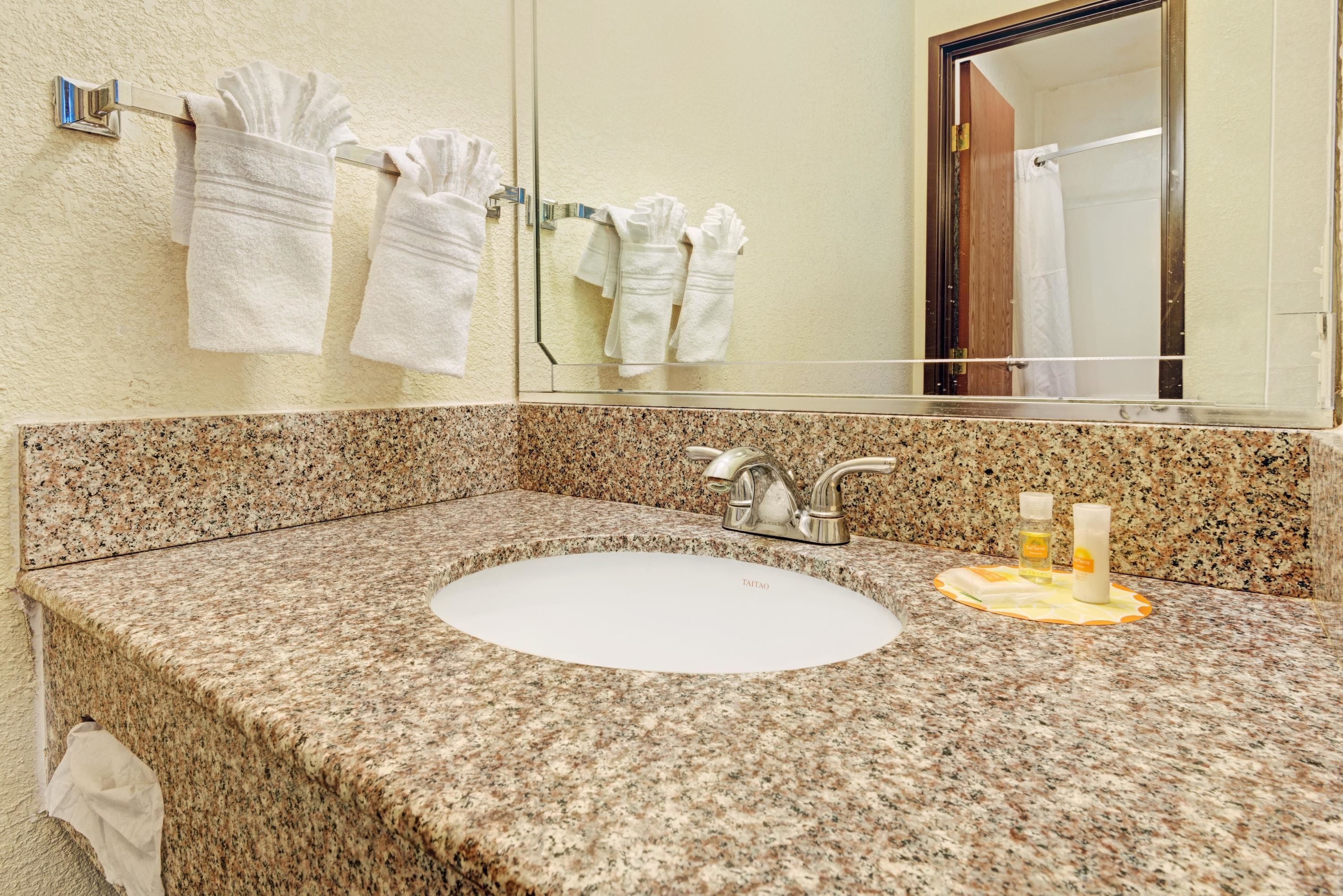 Bathtub, free toiletries, hair dryer, towels