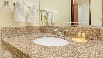 Bathtub, free toiletries, hair dryer, towels