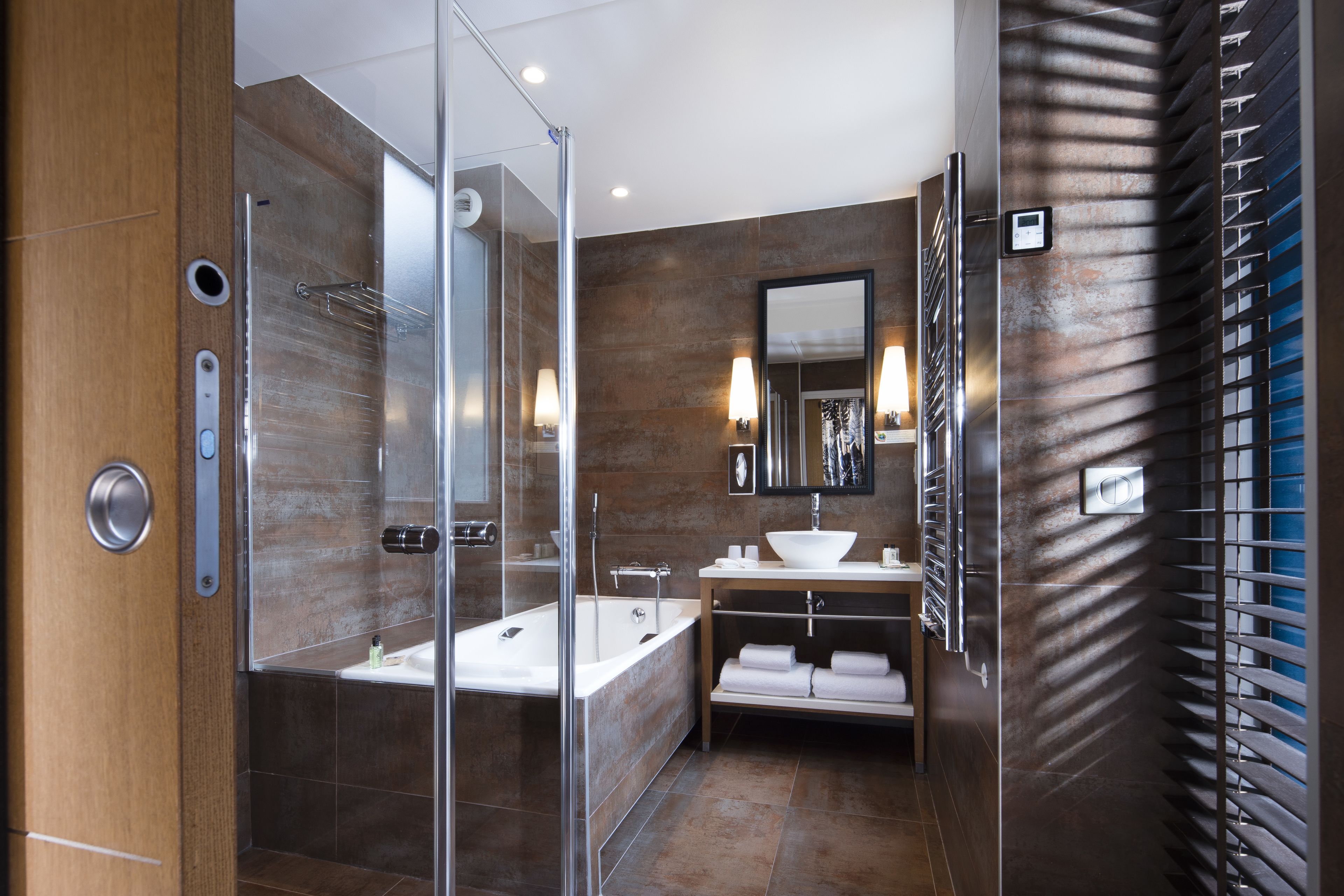 junior suite | bathroom | designer toiletries, hair dryer, bathrobes, slippers