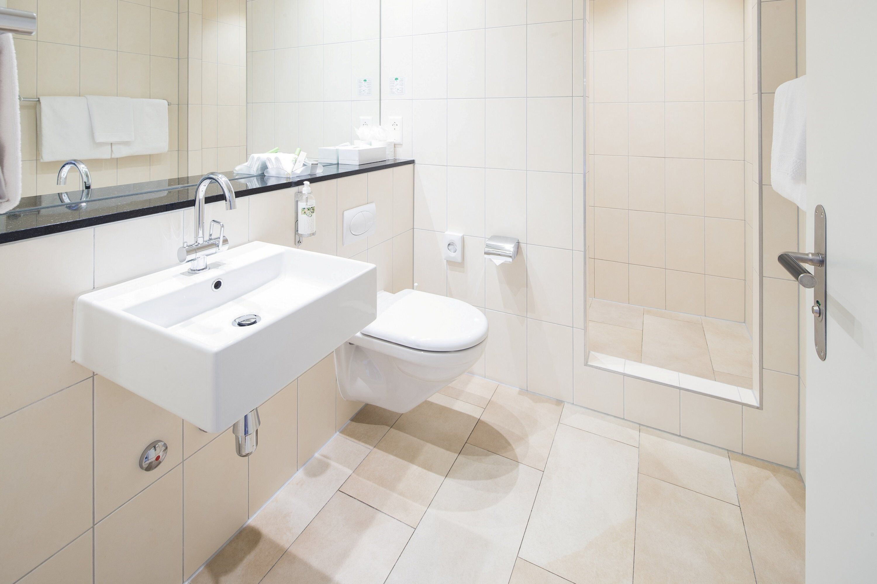 business double room | bathroom | designer toiletries, hair dryer, towels