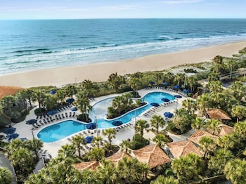2 outdoor pools, cabanas (surcharge), sun loungers at Hilton Myrtle Beach Resort