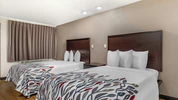 Desk, laptop workspace, blackout curtains, free cots/infant beds