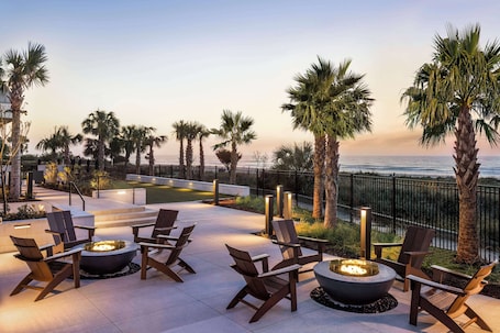 Terrace/patio. Embassy Suites by Hilton Myrtle Beach Oceanfront Resort