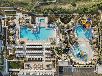 7 outdoor pools at Embassy Suites by Hilton Myrtle Beach Oceanfront Resort