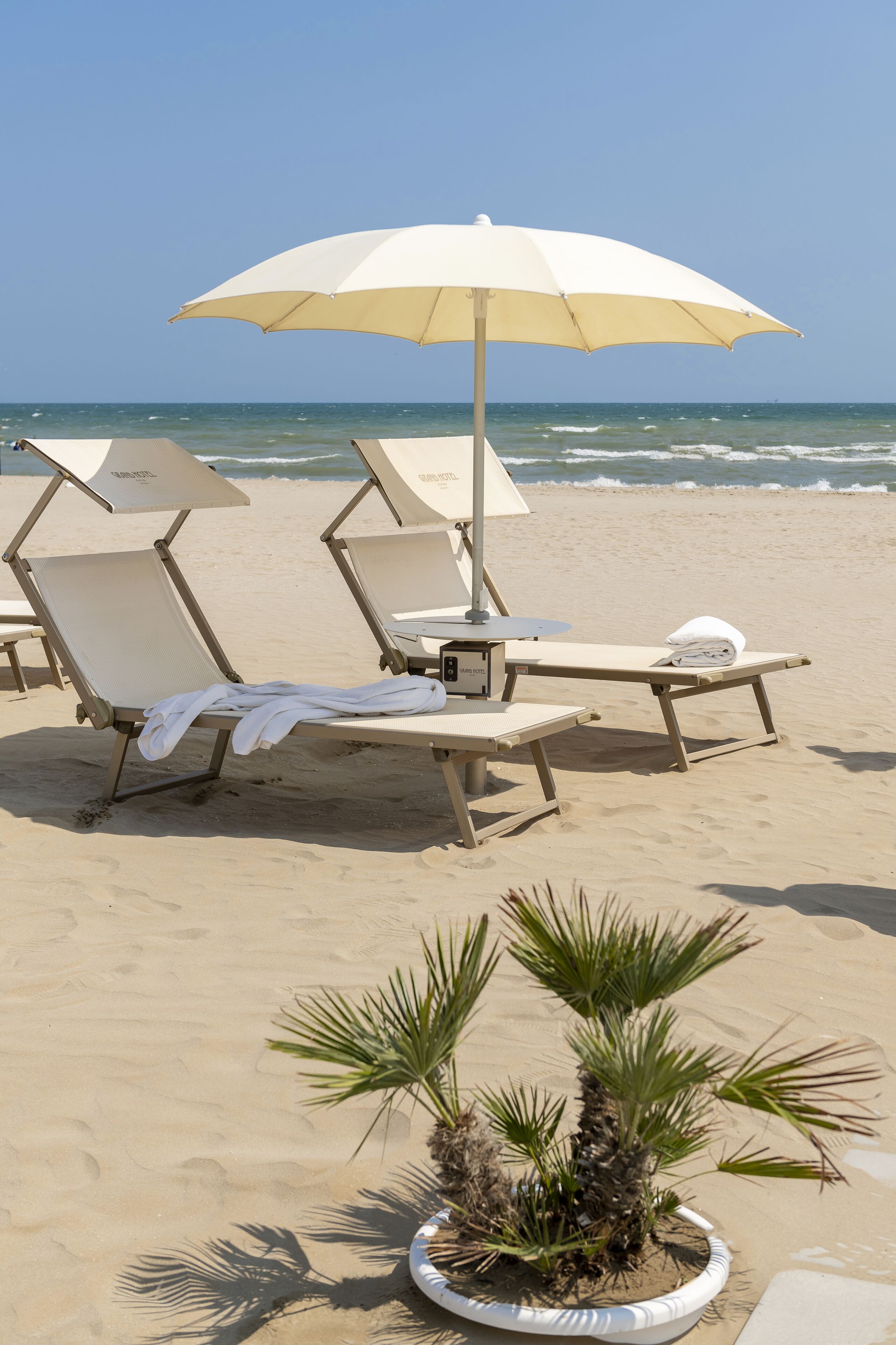private beach, beach cabanas, sun-loungers, beach umbrellas