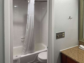 Standard Room, 2 Queen Beds, Non Smoking | Bathroom | Combined shower/bathtub, free toiletries, towels