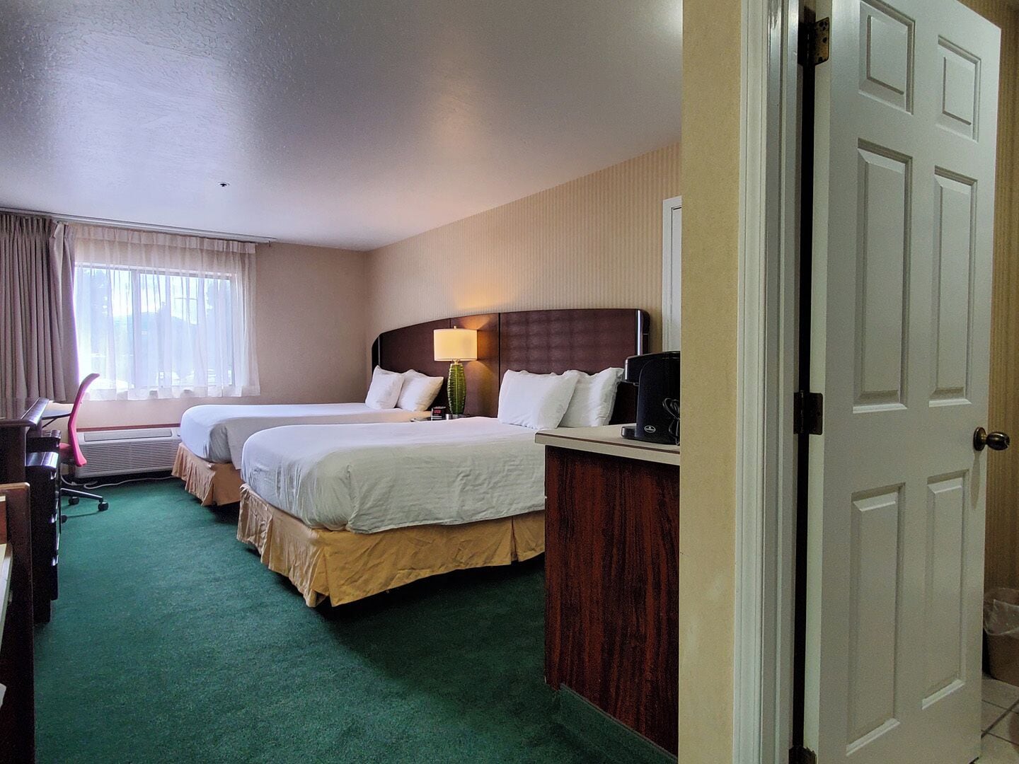 Premium bedding, desk, iron/ironing board, rollaway beds