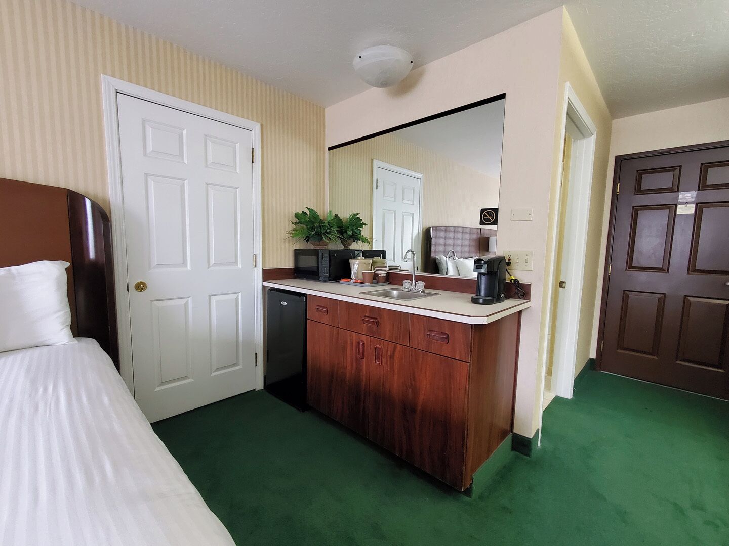 Premium bedding, desk, iron/ironing board, rollaway beds