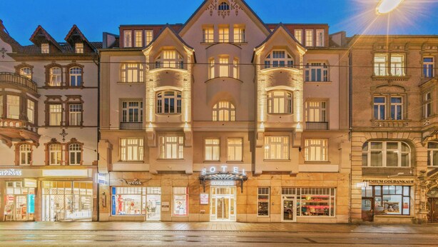 A historic hotel with a prominent entrance, multiple windows, and a traditional architectural style. - Best Western Plus Hotel Excelsior (Erfurt)