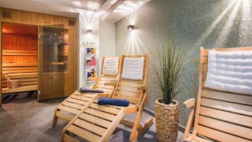 Relax in a serene spa area with massage chairs, towels, and a soothing atmosphere.