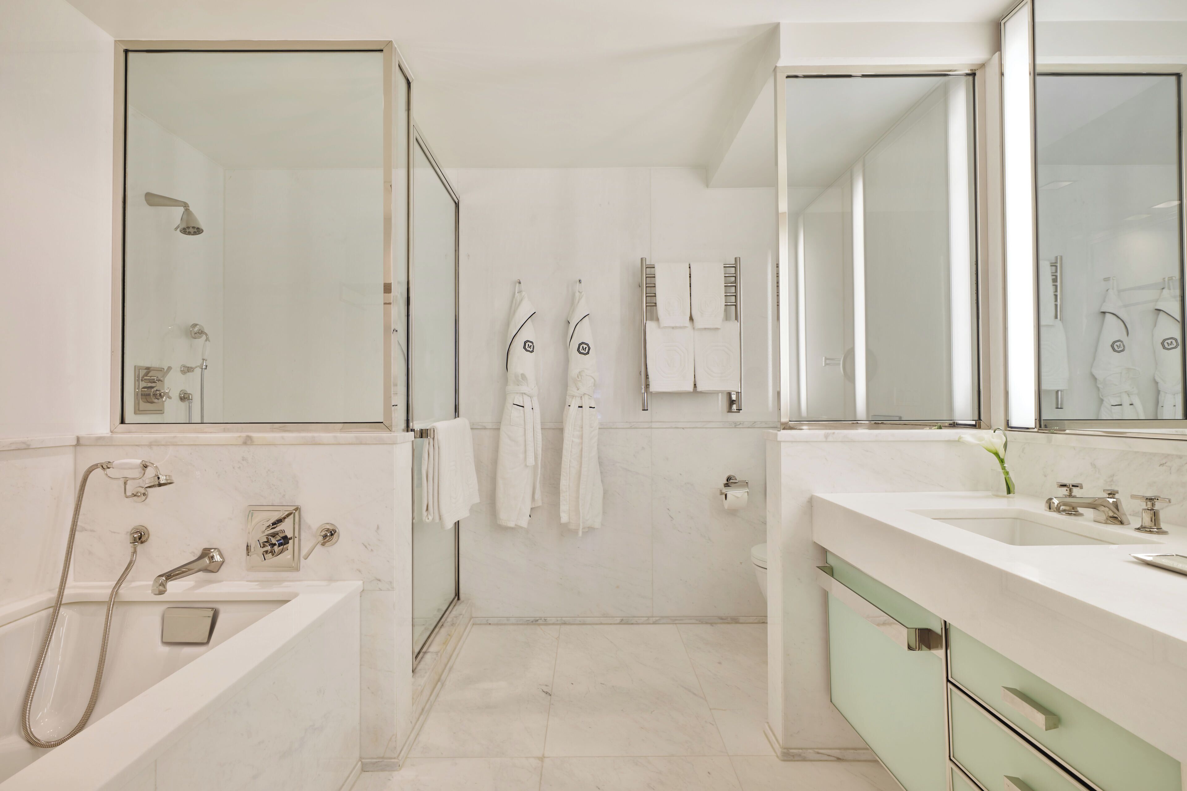 separate bathtub and shower, deep-soaking bathtub, designer toiletries