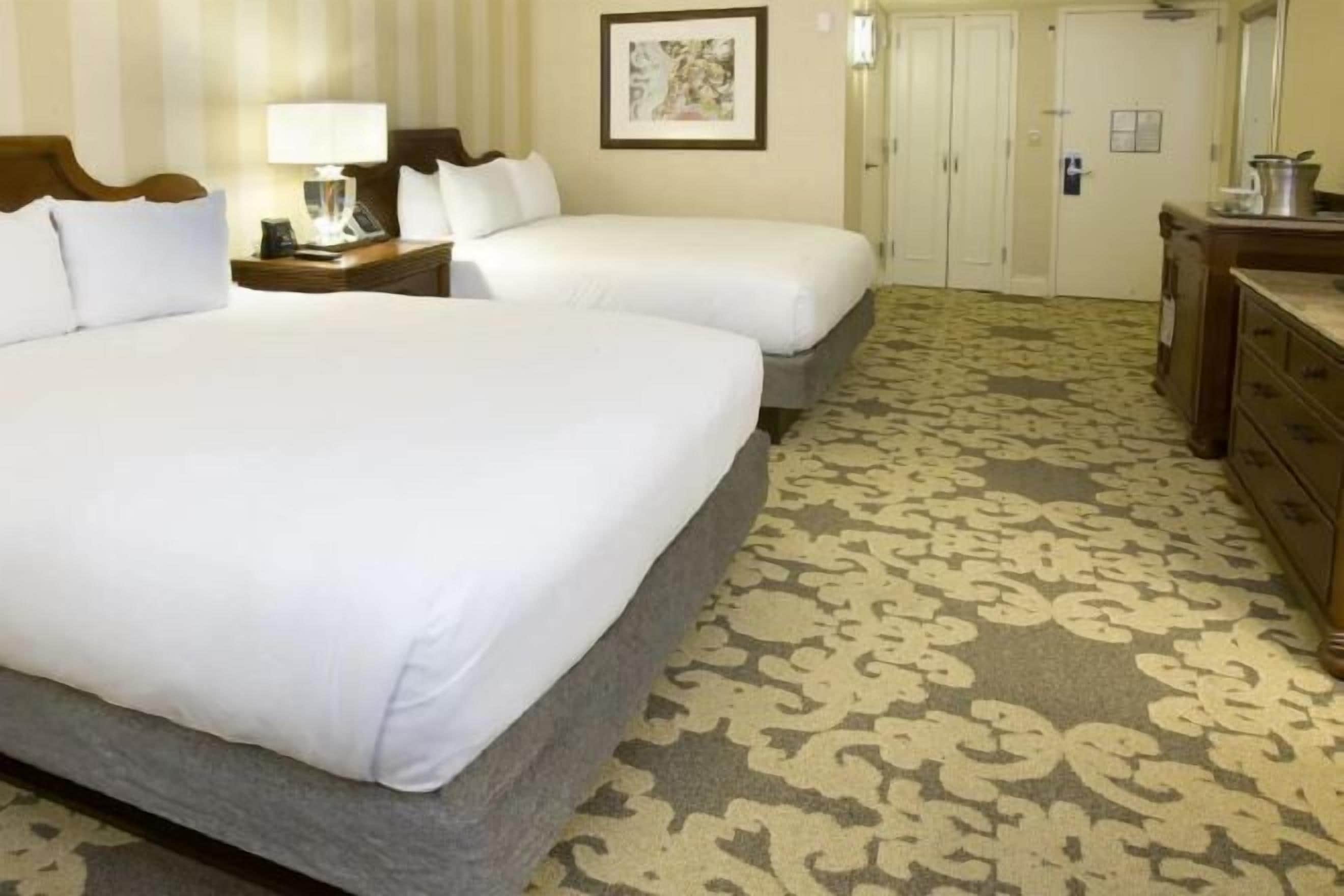 Premium bedding, down duvets, pillow-top beds, in-room safe