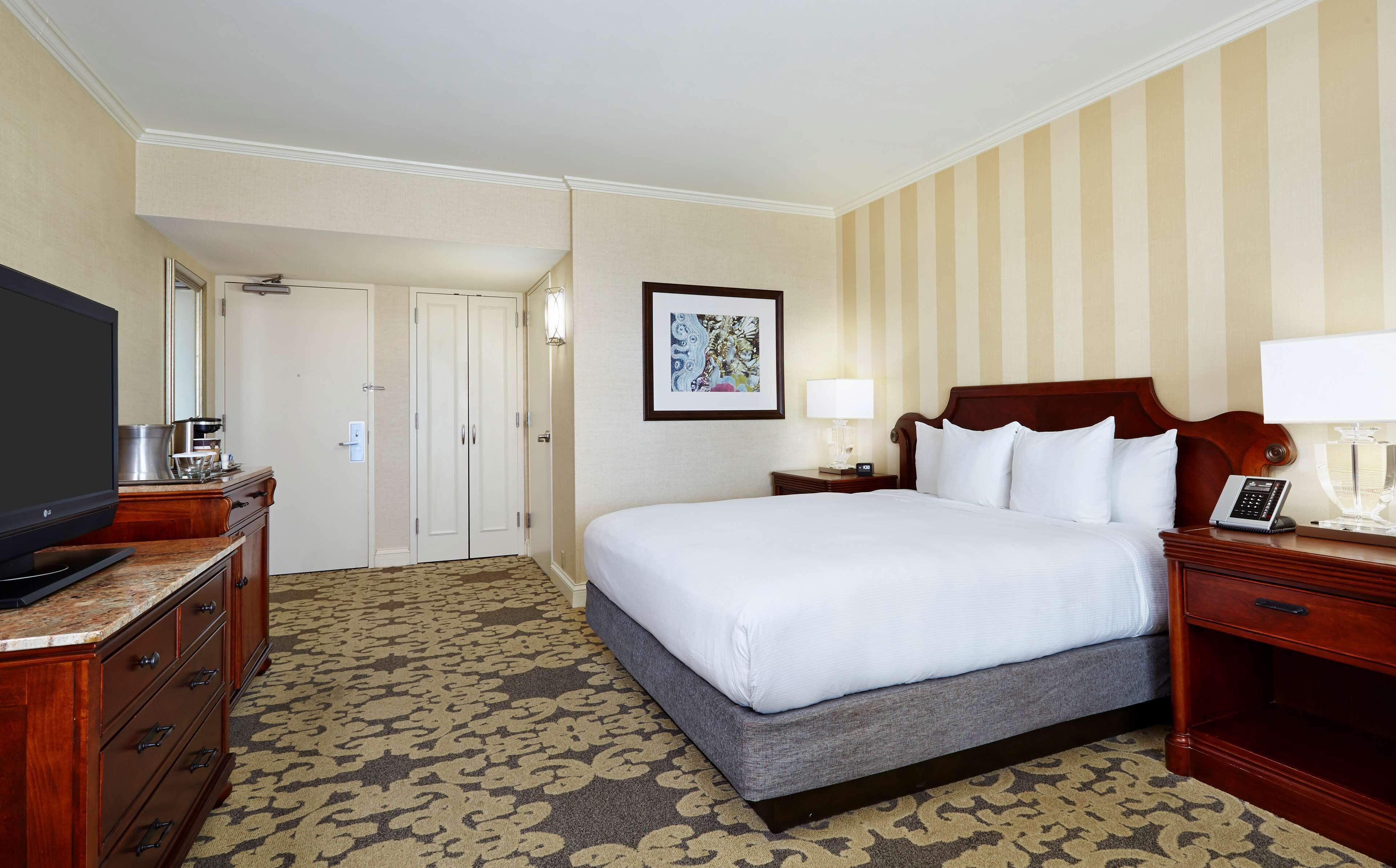 Premium bedding, down comforters, pillowtop beds, in-room safe