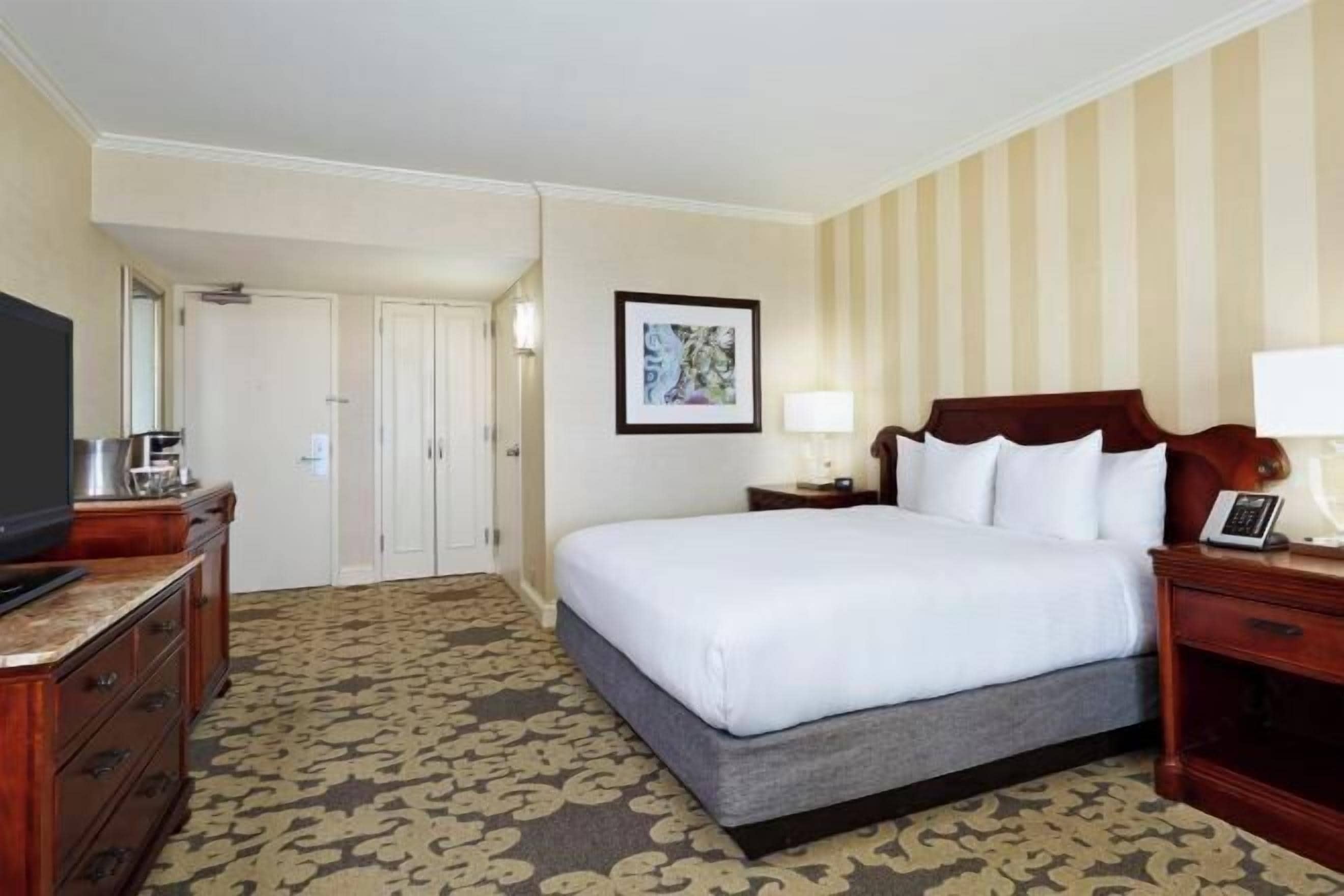 Premium bedding, down duvets, pillow-top beds, in-room safe