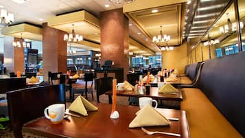 Daily buffet breakfast (USD 32.00 per person)