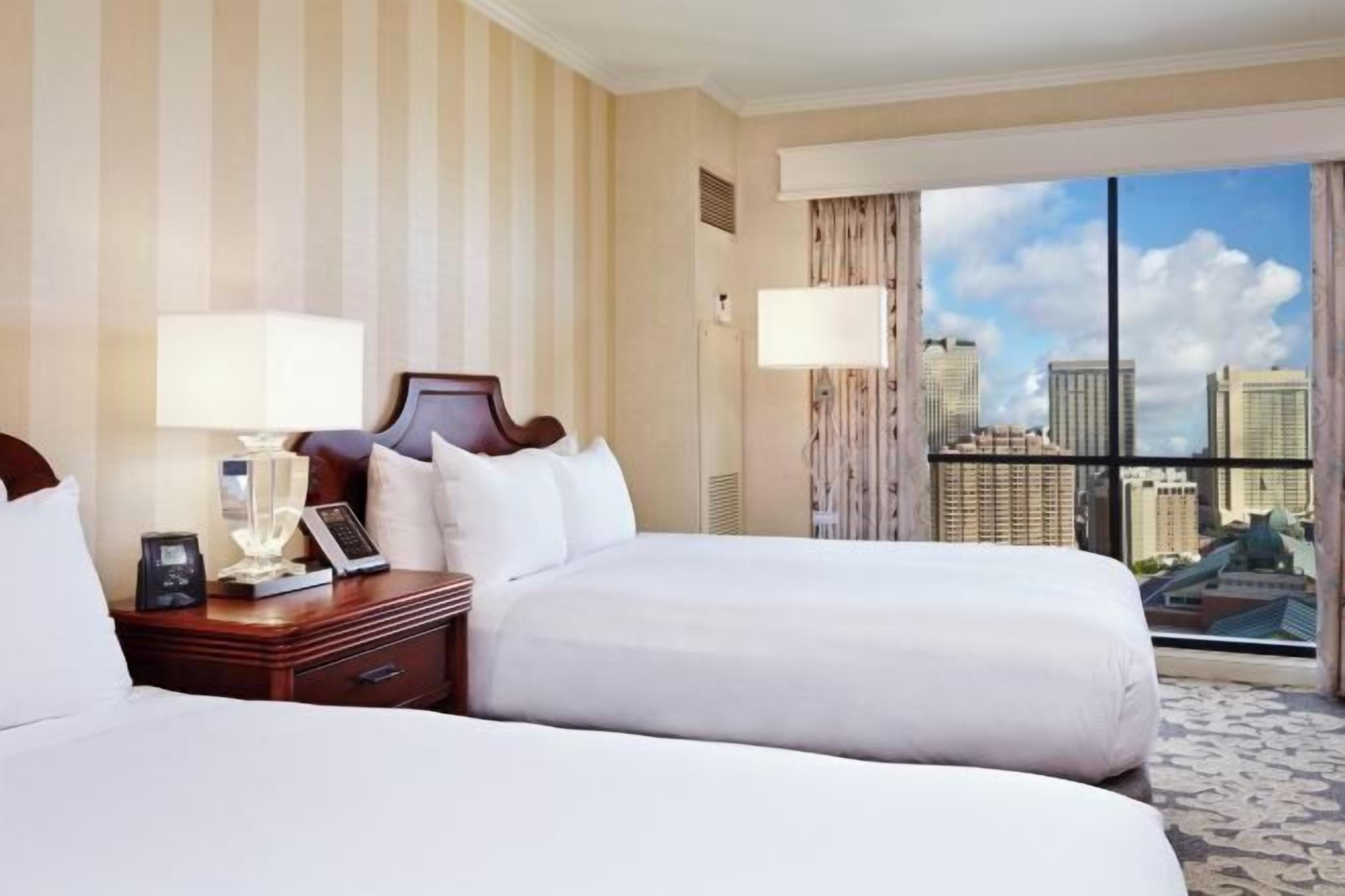 Premium bedding, down duvets, pillow-top beds, in-room safe