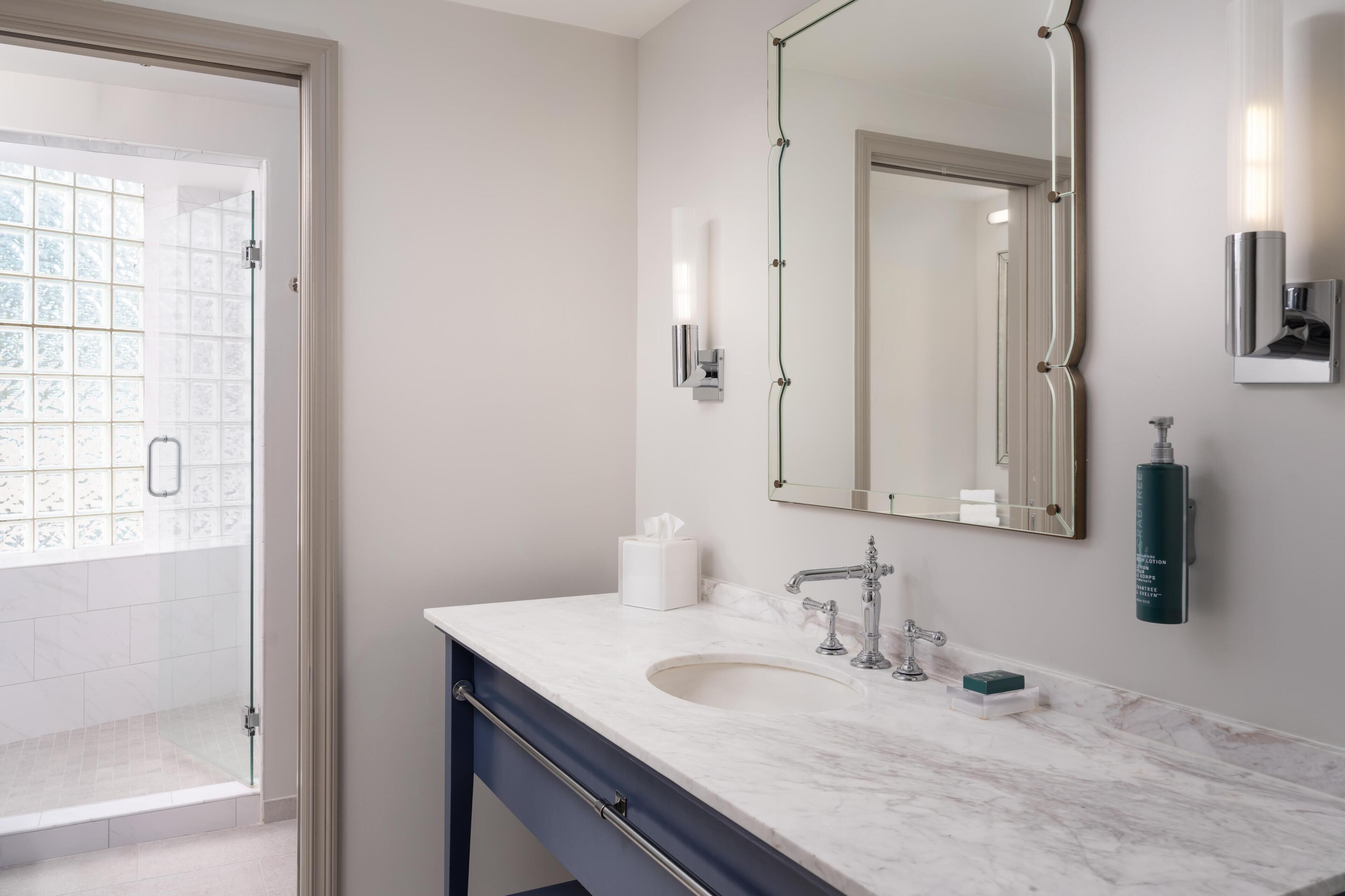 Executive Suite, 1 King Bed | Bathroom | Designer toiletries, hair dryer, towels, soap