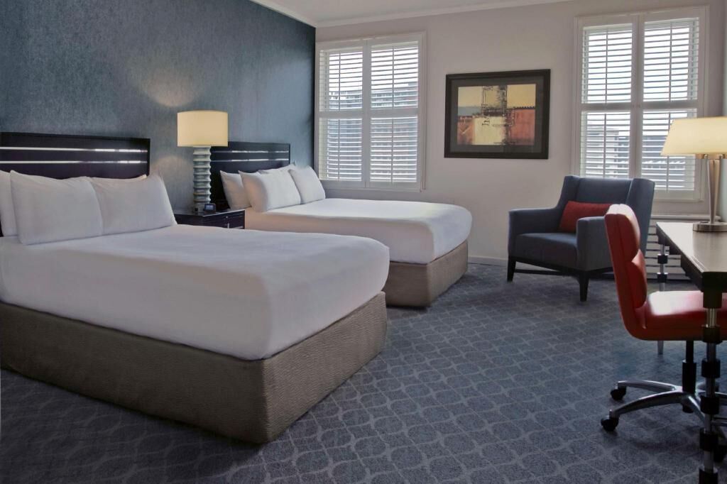 Premium bedding, down comforters, pillowtop beds, in-room safe