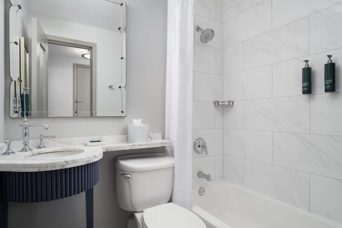 Designer toiletries, hair dryer, towels, soap