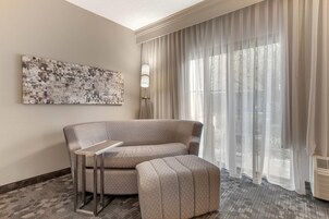 Standard Room, 1 King Bed with Sofa bed, Non Smoking, Courtyard View (Patio) | Desk, laptop workspace, blackout drapes, iron/ironing board