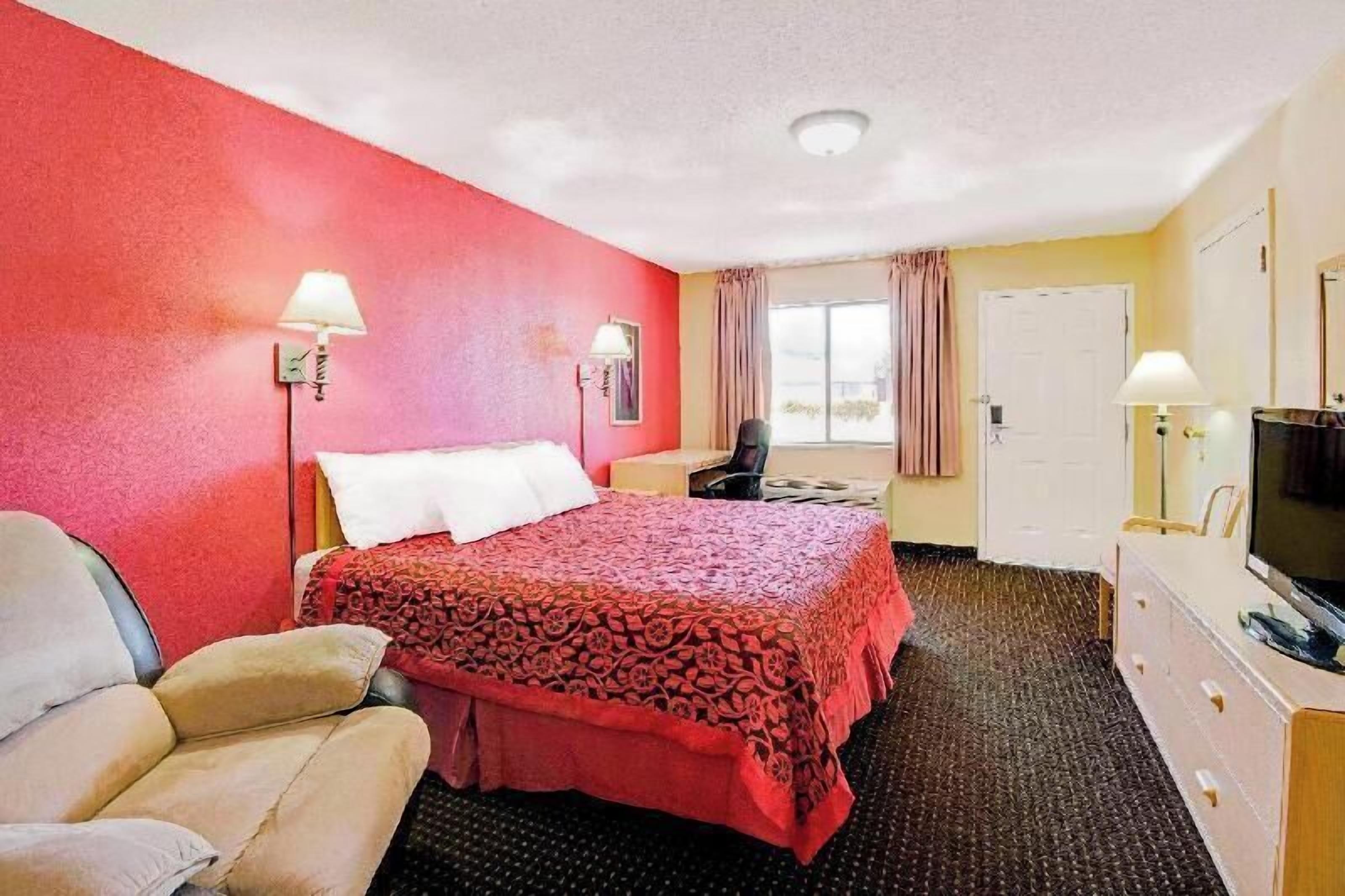 Desk, blackout curtains, free WiFi, bed sheets