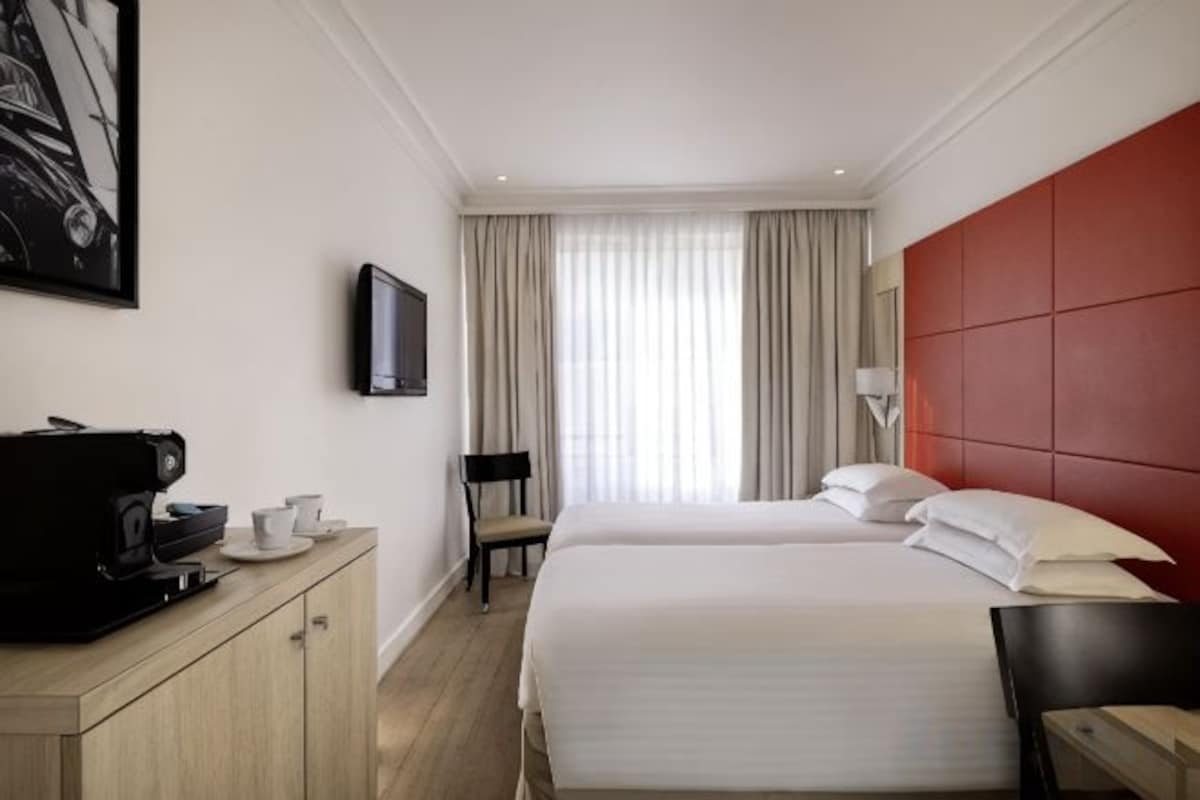 Premium bedding, minibar, in-room safe, blackout drapes