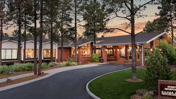 Experience a welcoming atmosphere at this modern establishment, featuring a combination of brick and glass facades.