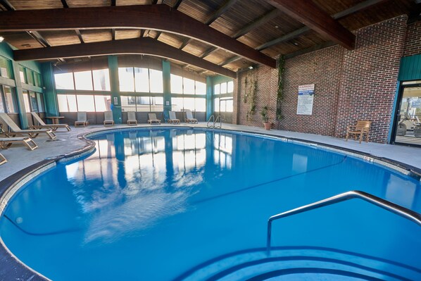 Indoor pool, open 7:00 AM to 10:00 PM, pool loungers