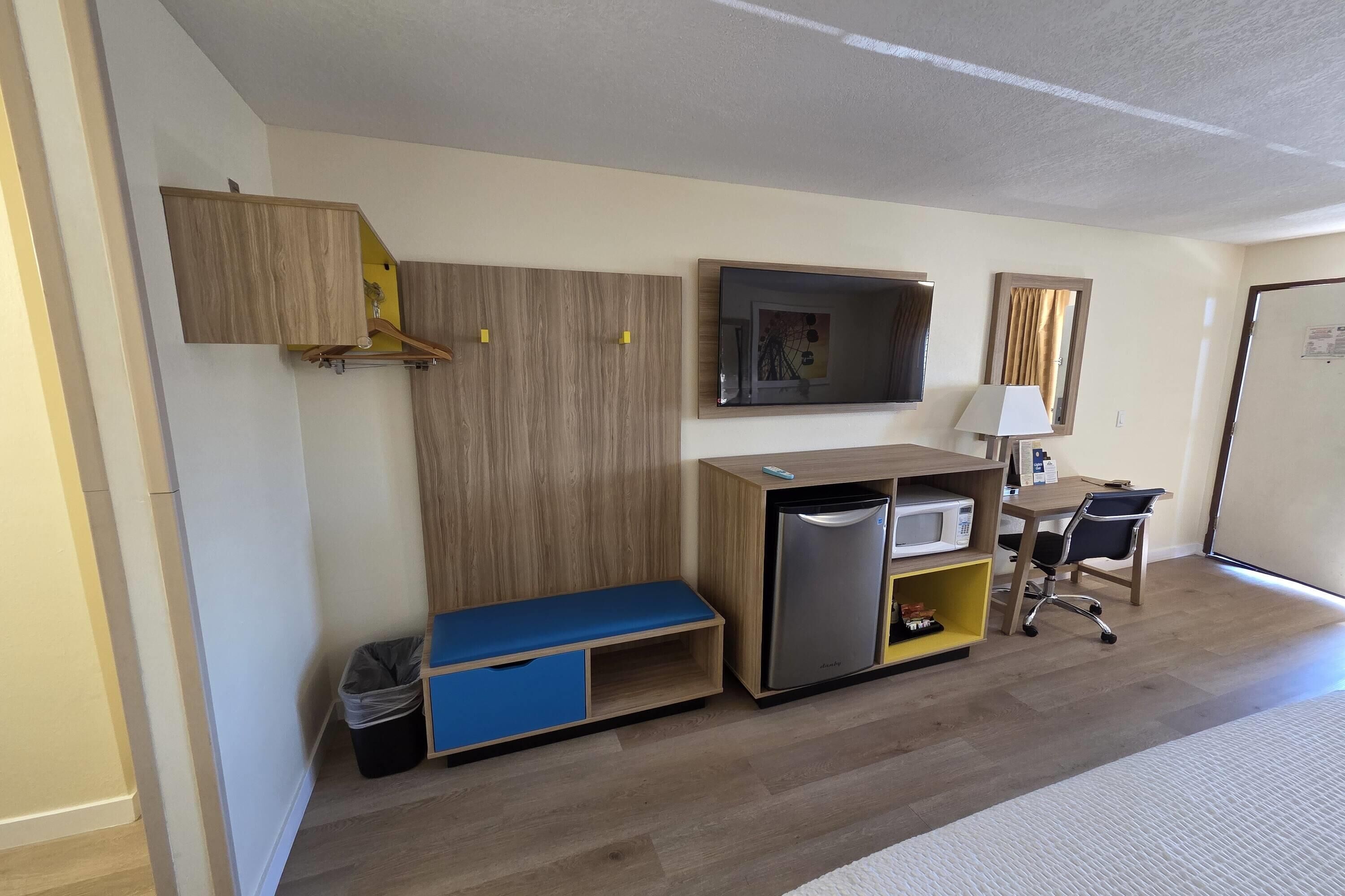 Desk, laptop workspace, blackout curtains, iron/ironing board