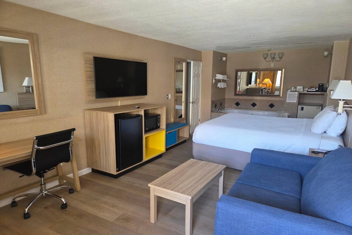 Upgraded, Room, 1 King Bed, Non Smoking, Hot Tub | Desk, laptop workspace, blackout drapes, iron/ironing board