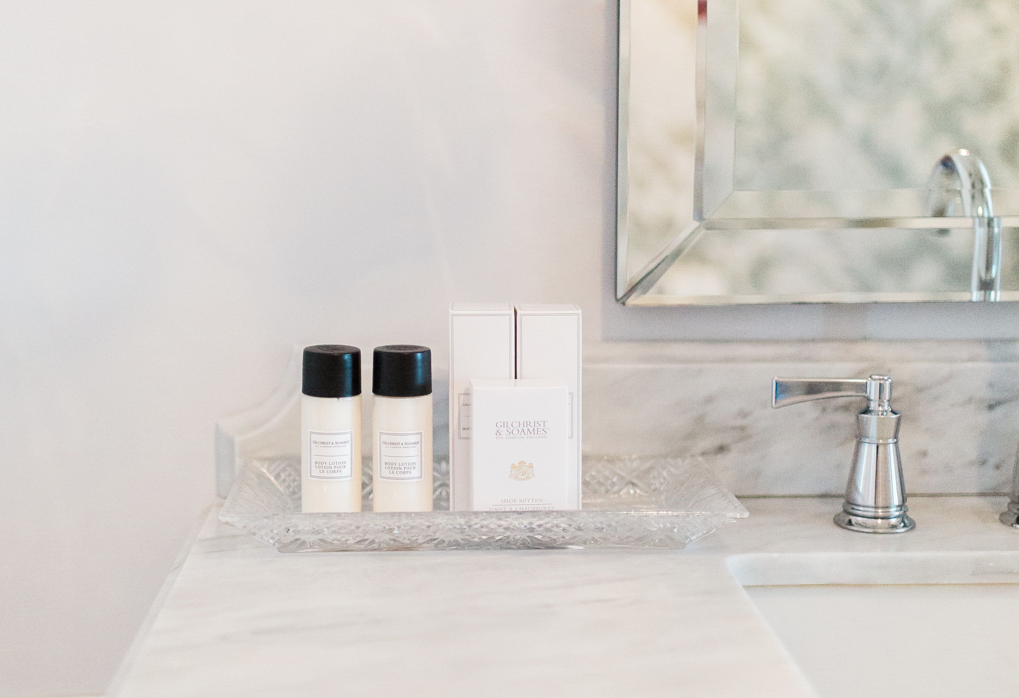 combined shower/bathtub, rainfall showerhead, designer toiletries