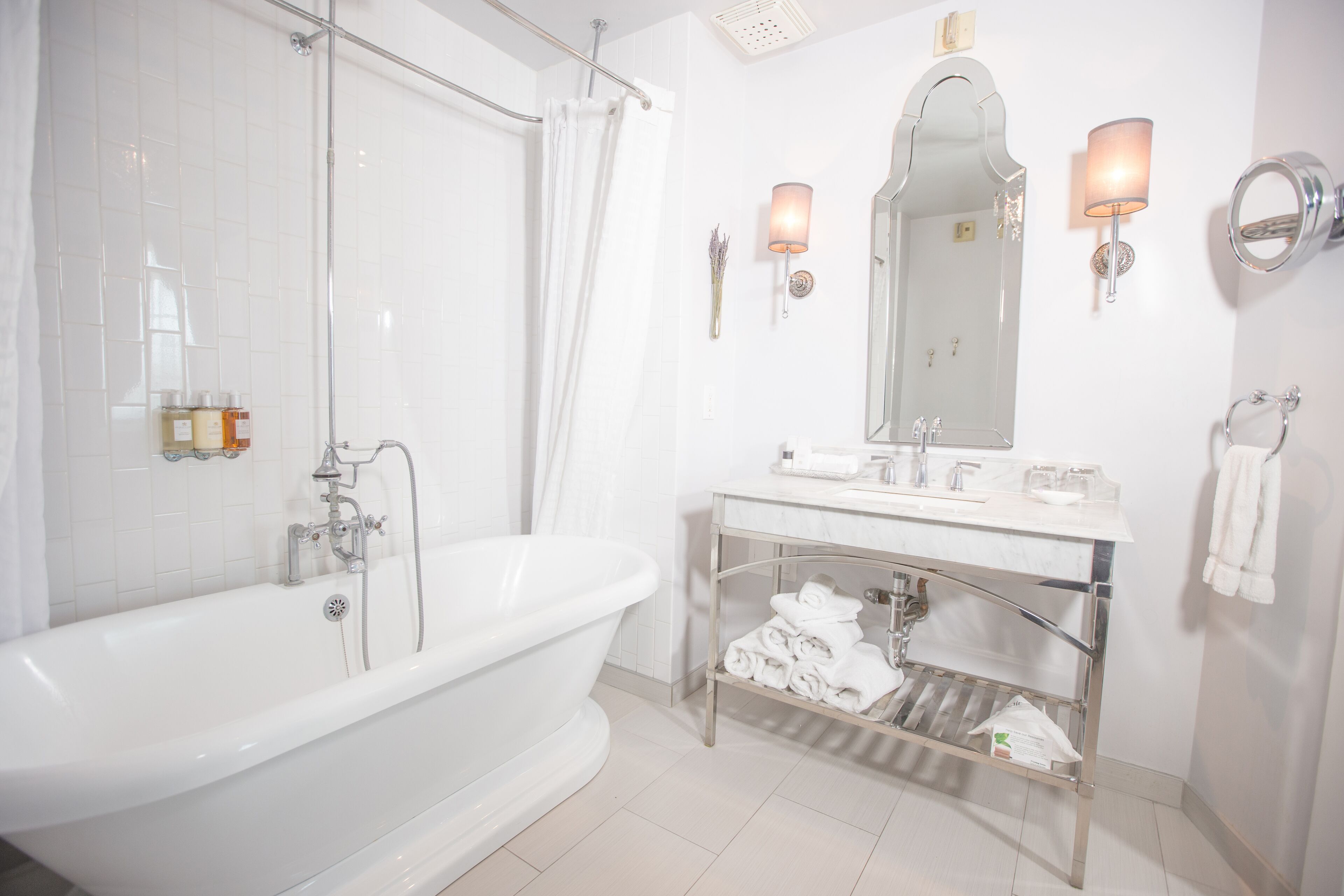 suite | bathroom | combined shower/bathtub, rainfall showerhead, designer toiletries