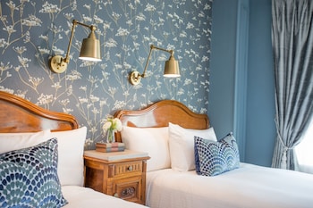 Egyptian cotton sheets, premium bedding, down comforters, in-room safe at The Culver Hotel