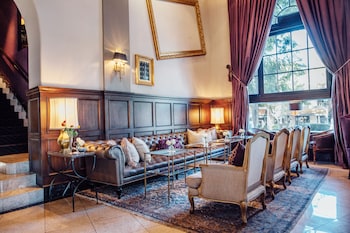 Sitting area in hotel lobby at The Culver Hotel