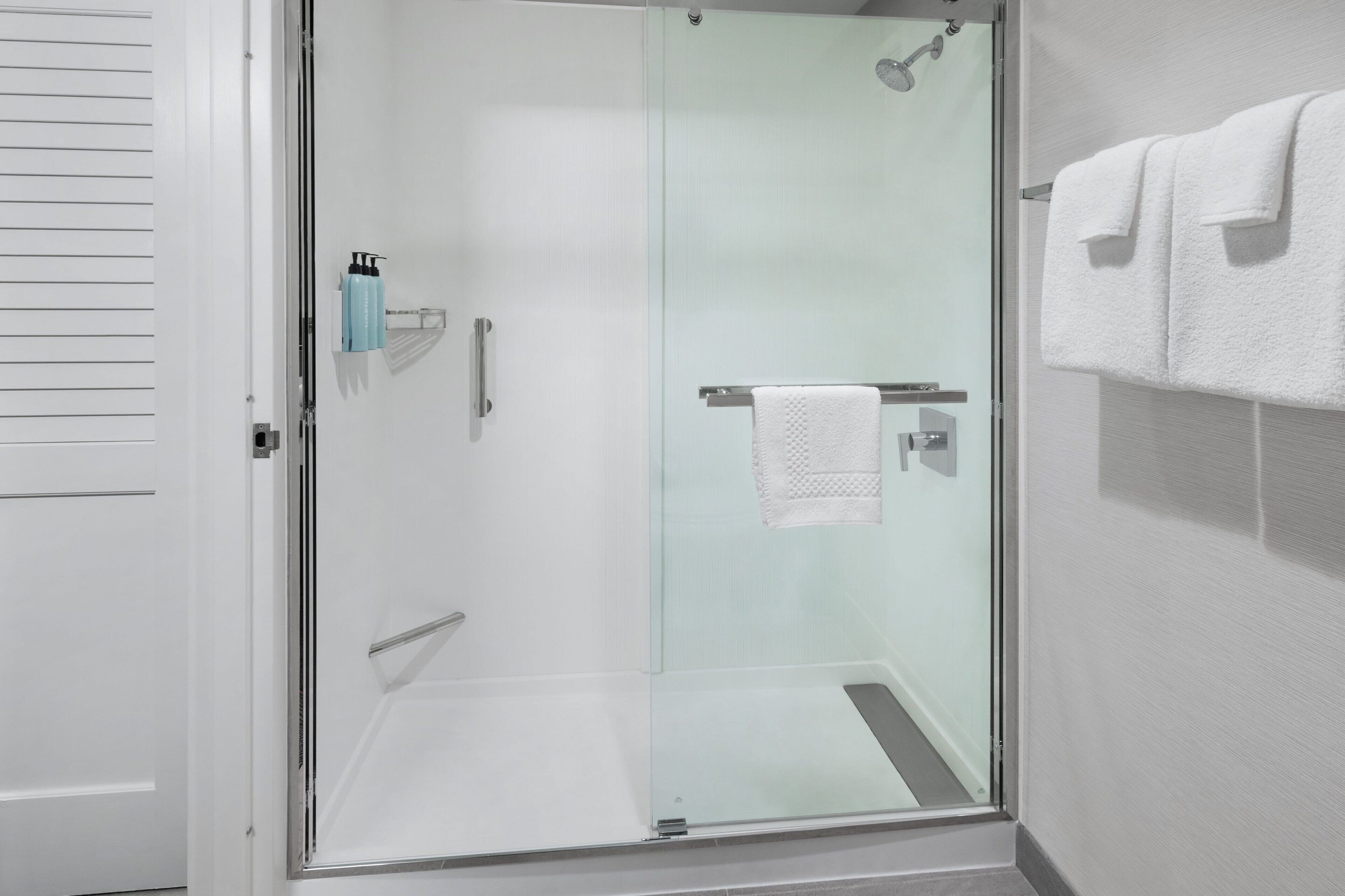 combined shower/bathtub, free toiletries, hair dryer, towels