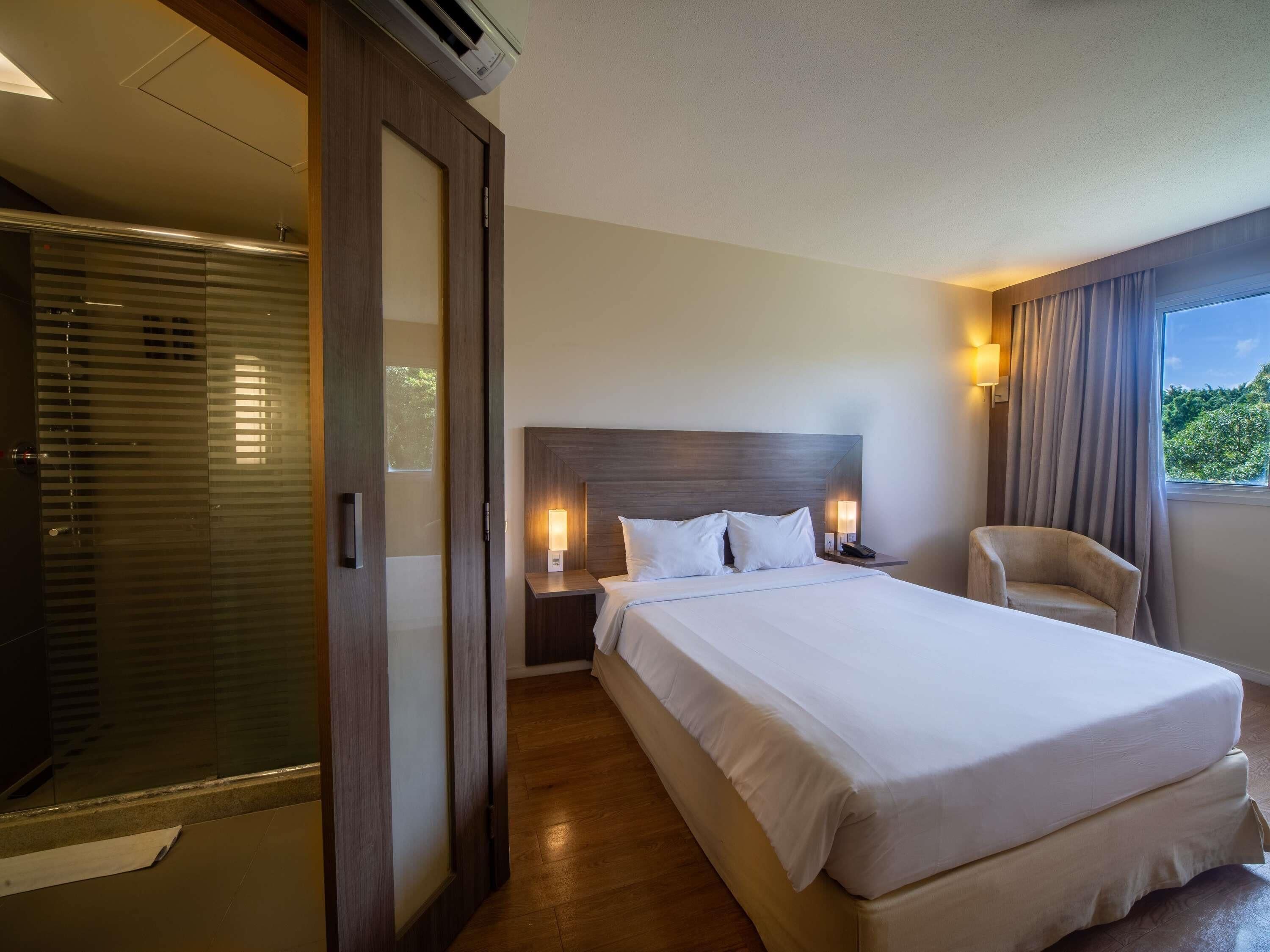 Quarto executivo, 1 cama de casal | Frigobar, cofres nos quartos, escrivaninha, cortinas blackout