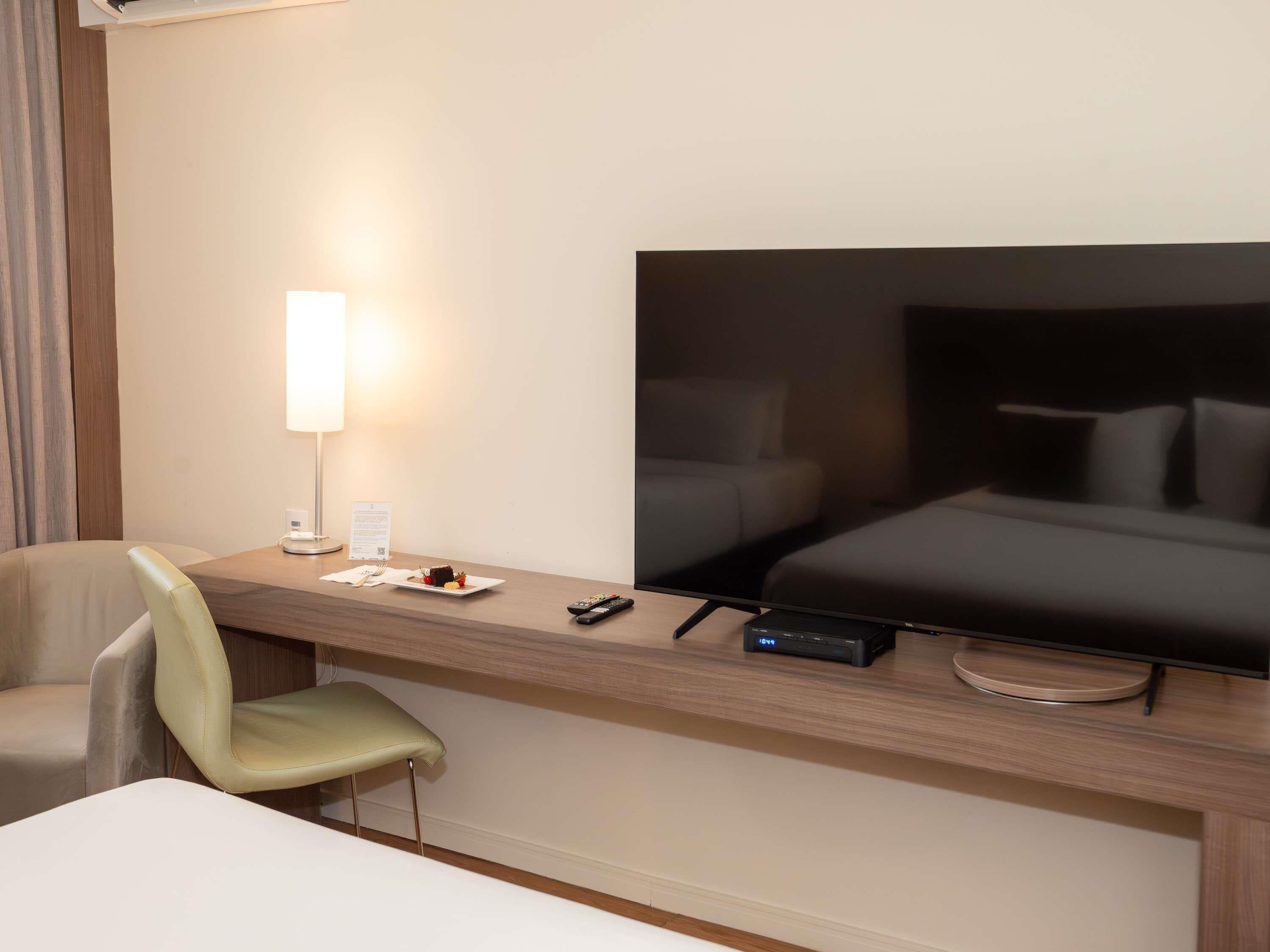 Apartment, Multiple Beds (3 Adults) | Minibar, in-room safe, desk, blackout drapes