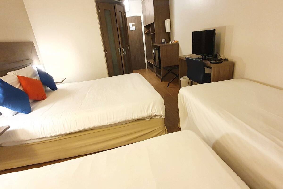 family room, multiple beds | minibar, in-room safe, desk, blackout curtains