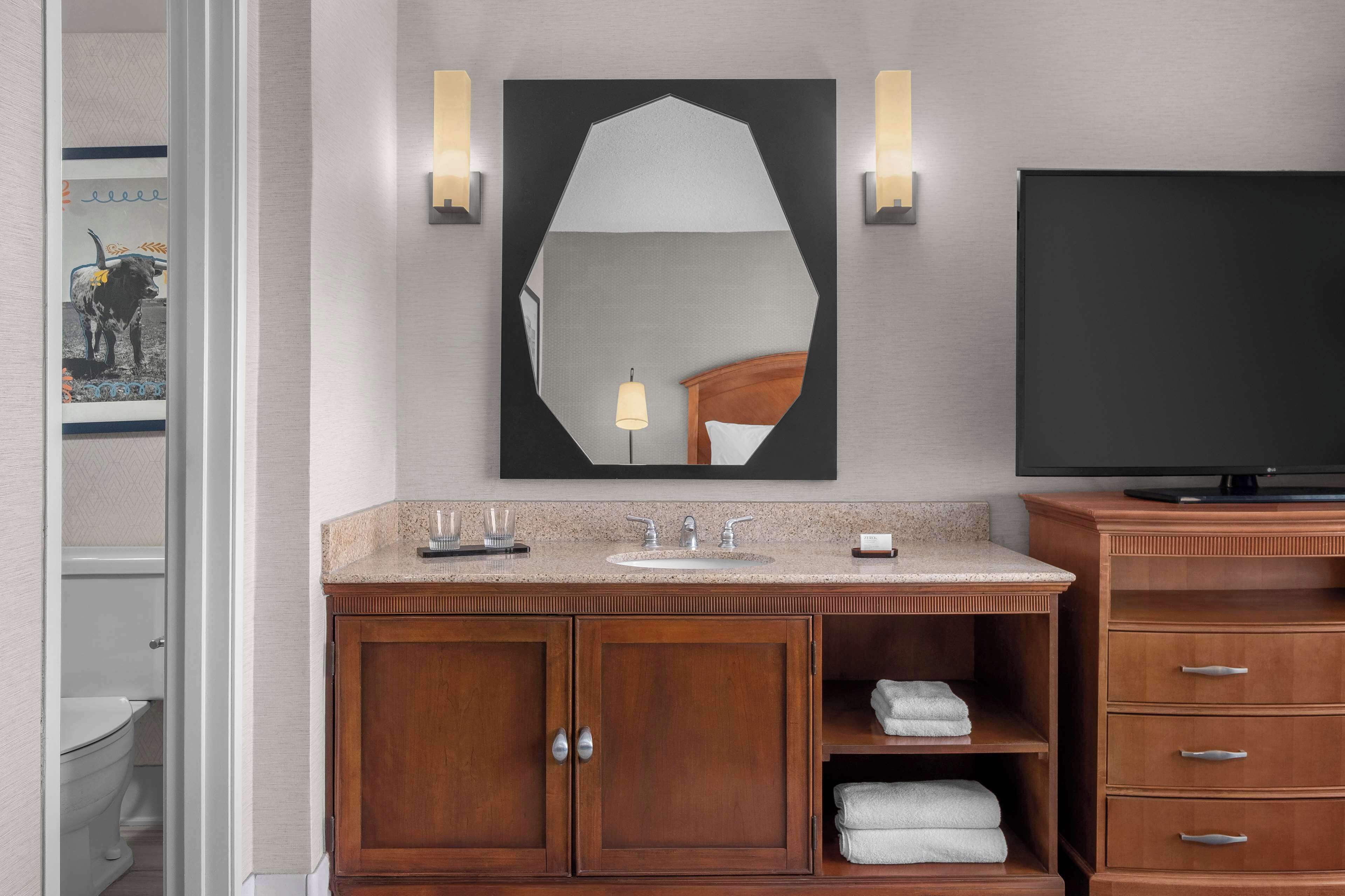 combined shower/bathtub, free toiletries, hair dryer, towels