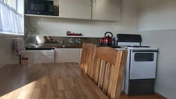 Standard Studio, Kitchen (Spacious ) | Private kitchen | Fridge, microwave, coffee/tea maker, electric kettle