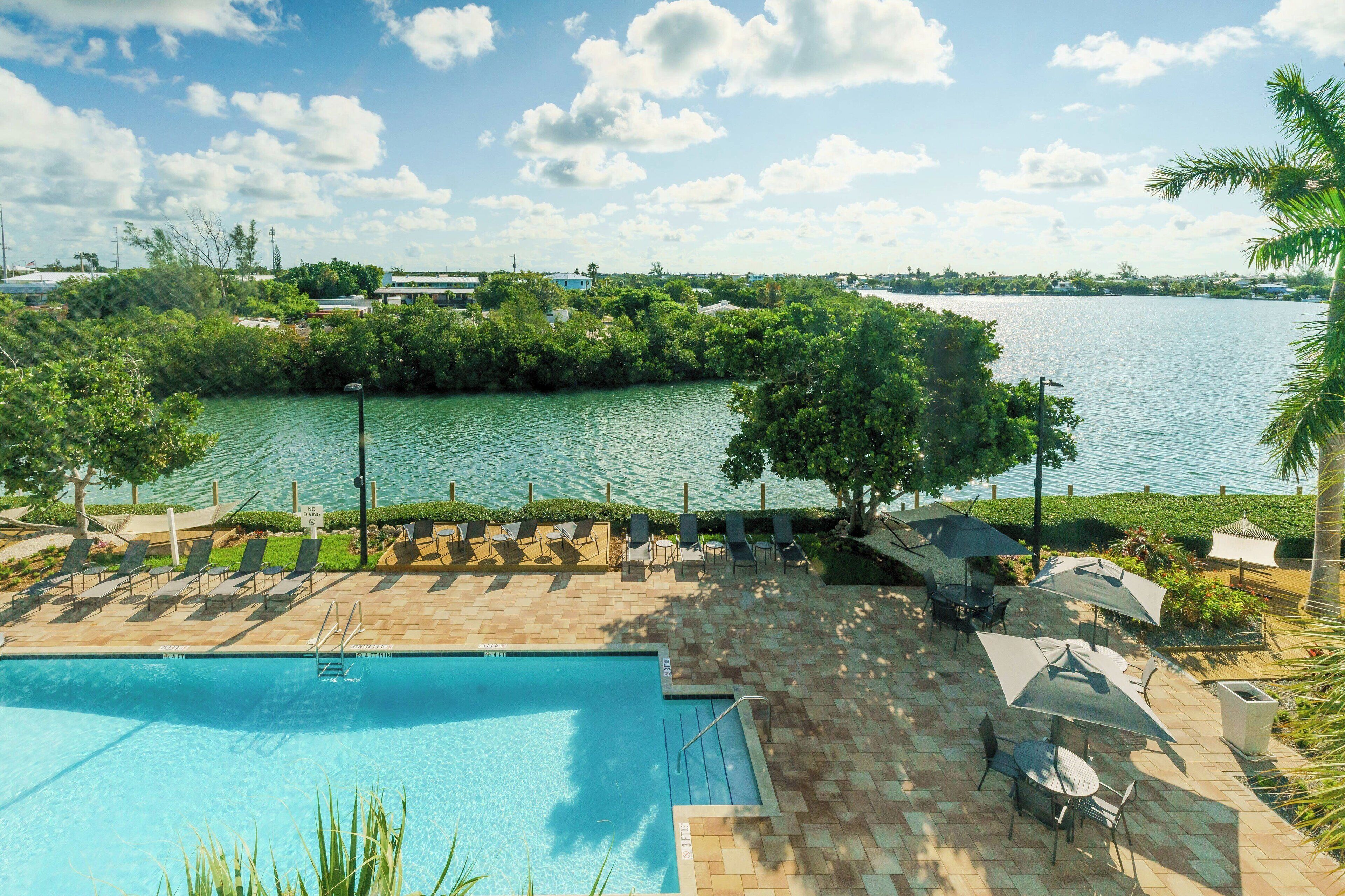 2 outdoor pools, pool umbrellas, pool loungers