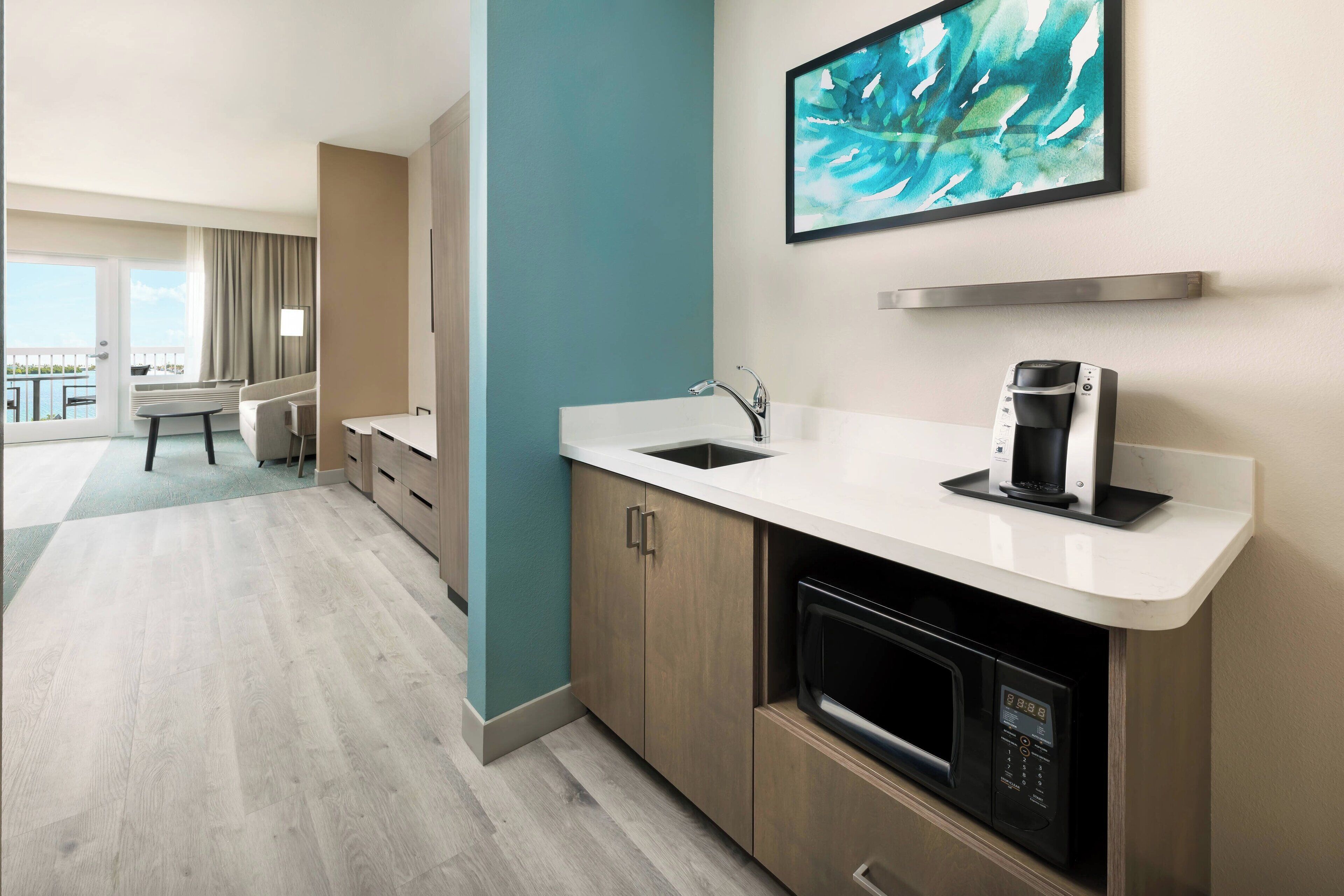 suite, 1 king bed with sofa bed, balcony, bay view | premium bedding, in-room safe, individually decorated