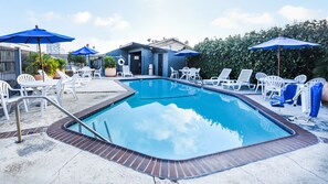 Outdoor pool, open 10:00 AM to 9:00 PM, sun loungers