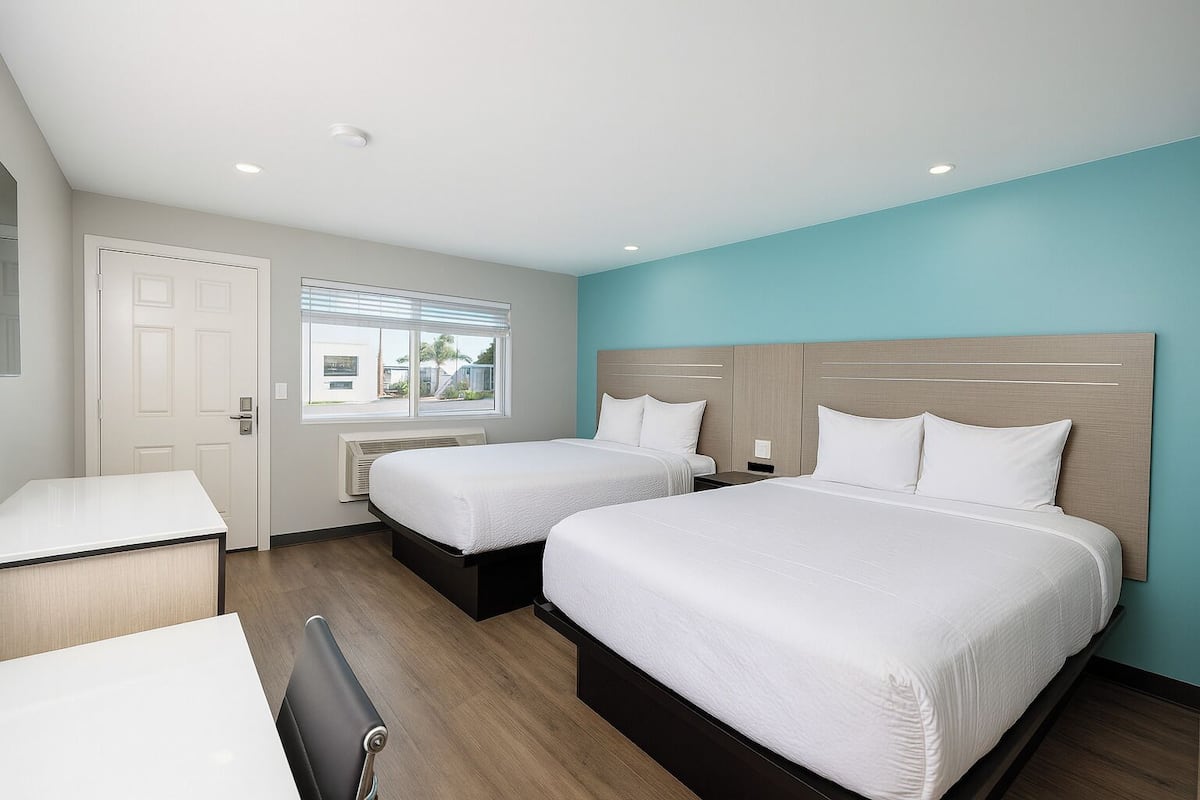 Suite, 2 Queen Beds, Non Smoking | Desk, iron/ironing board, free WiFi, bed sheets