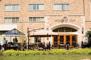 A brick building with the sign "Morris Inn" above the entrance.