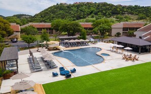 2 outdoor pools, open 7:00 AM to 10:30 PM, pool umbrellas, pool loungers