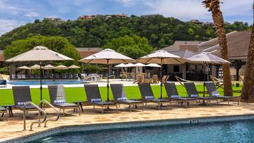 2 outdoor pools, open 7:00 AM to 10:30 PM, pool umbrellas, sun loungers