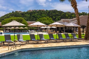 2 outdoor pools, open 7:00 AM to 10:30 PM, pool umbrellas, pool loungers