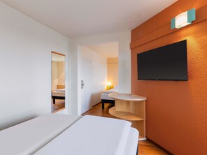 Habitación familiar | Escritorio, cortinas opacas, sistema de insonorización y wifi gratis